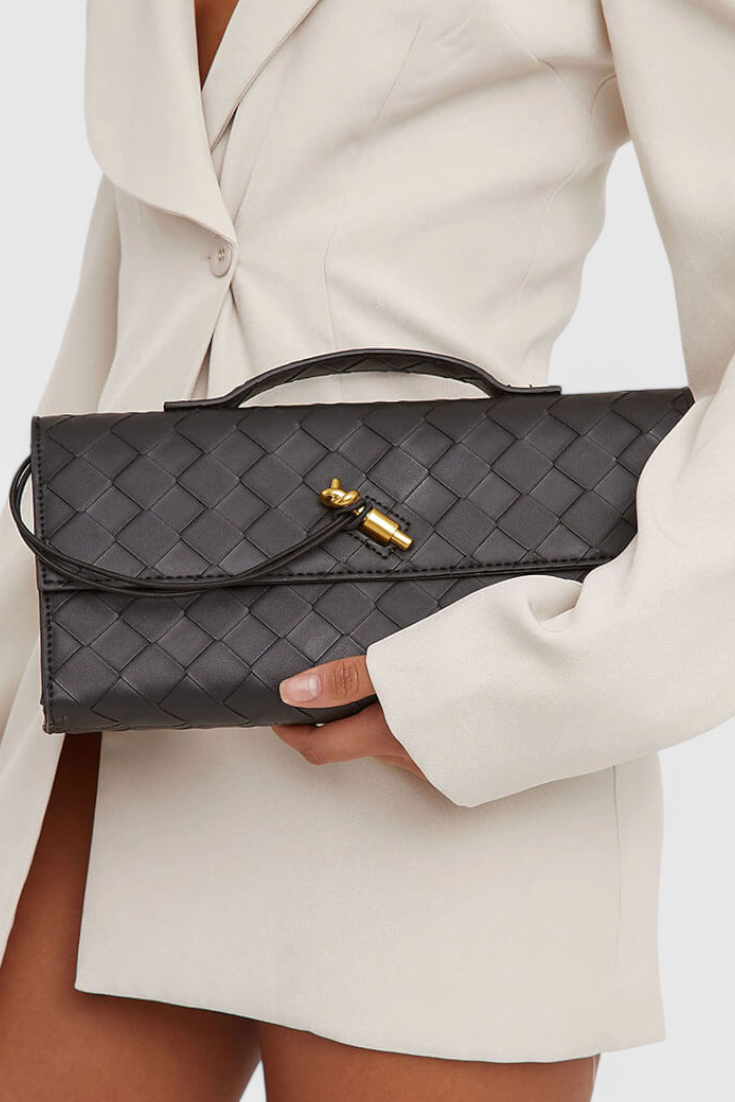 Melanie | Cartera de mano con lazo dorado